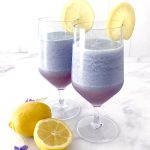 two glasses of frozen violet lemonade made at home